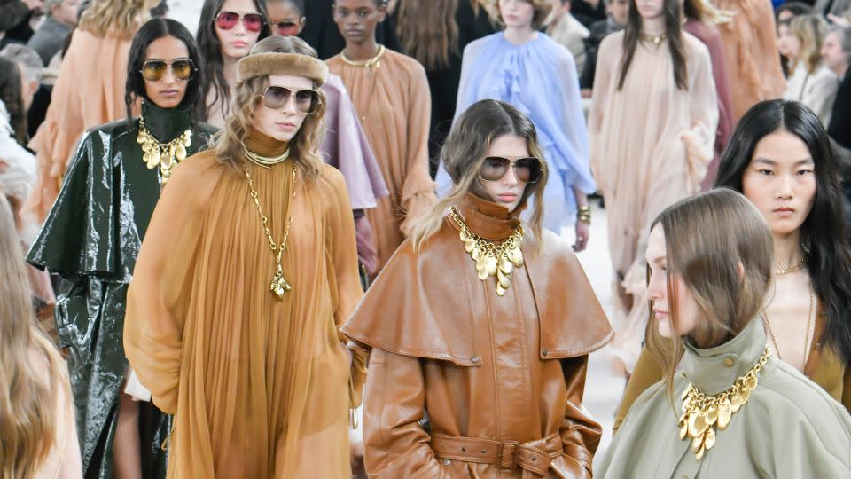 Stockman-style coats in colored, patent and soft leather were everywhere at Chloé, as were thigh-high boots and wafting, chiffon dresses. - Jonas Gustavsson for The Washington Post/Getty Images