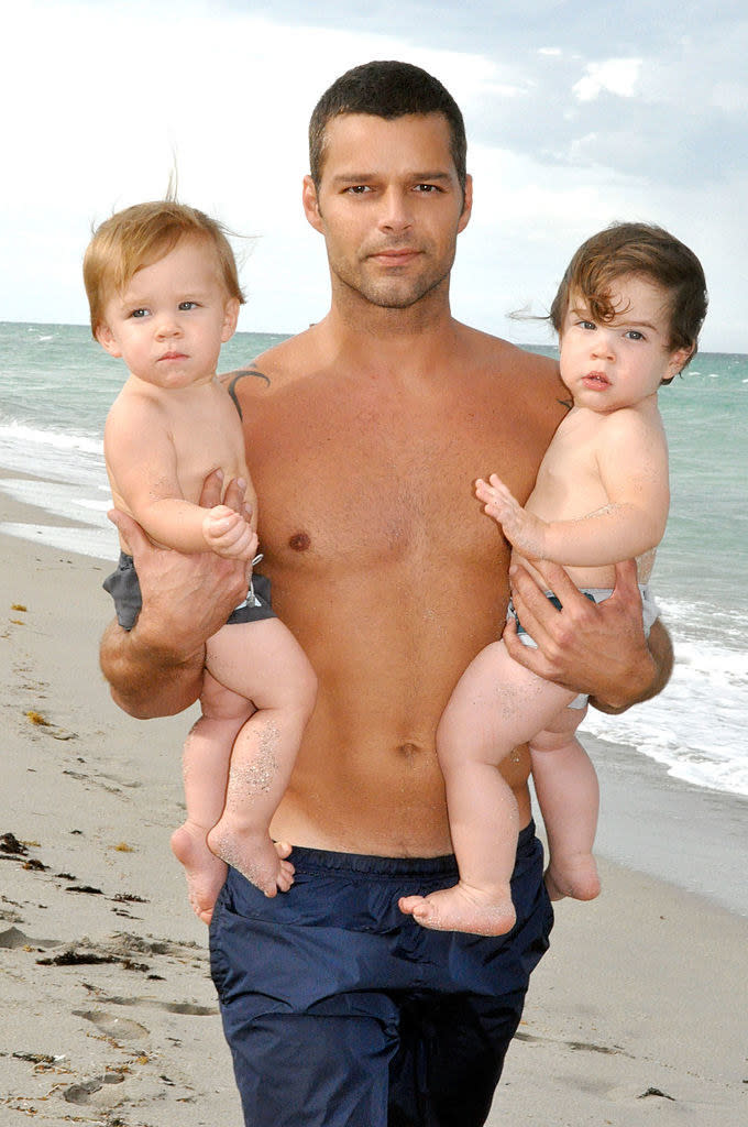 rickey holding two babies