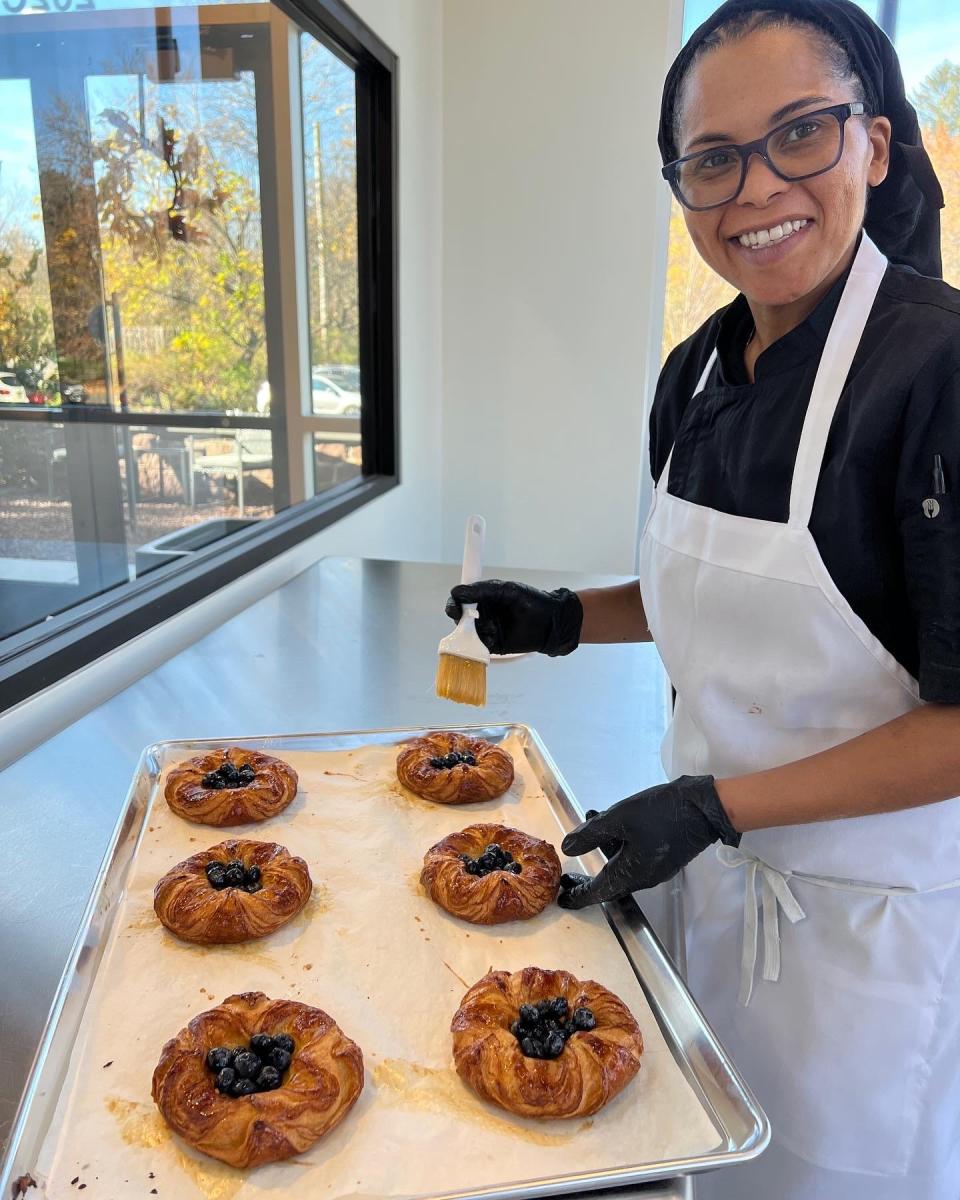 Co-owner and Chef Magali Henry prepares a tray of French viennoiserie at Mamie Colette, a new artisan bakery which opened last month in Newtown.