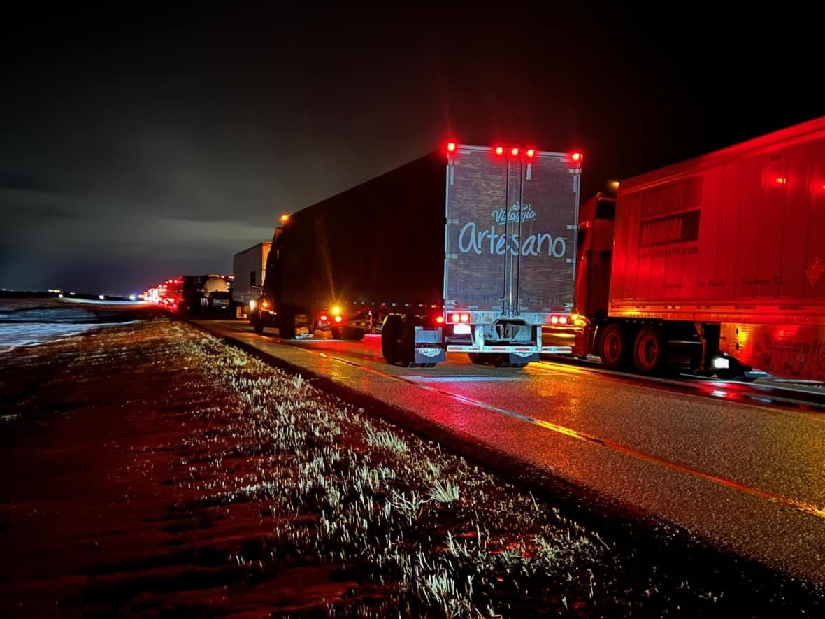 A Saskatchewan man says he spent the night in his vehicle parked on Highway 1 after traffic ground to a halt Tuesday night. (Submitted to CBC - image credit)