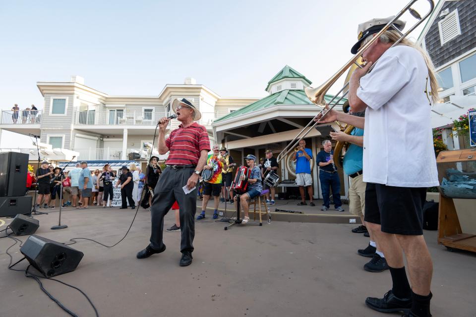 'Mourners' gathered to send off the summer of 2023 at the annual Bethany Beach Jazz Funeral on the boardwalk in Bethany Beach on Labor Day, Monday.