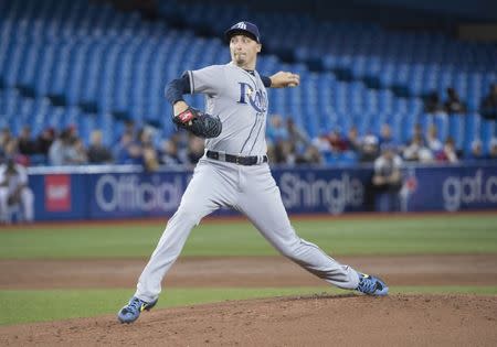 FILE PHOTO: Apr 13, 2019; Toronto, Ontario, CAN; Tampa Bay Rays starting pitcher Blake Snell (4) throws a pitch during the first inning against the Toronto Blue Jays at Rogers Centre. Mandatory Credit: Nick Turchiaro-USA TODAY Sports