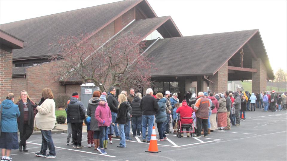 Hundreds of visitors to Walnut Creek last year start the Journey to Bethlehem at the Mennonite Church where they register for their visit and get a map to area stores and places to visit along the journey. This year's event takes place Dec. 2-3.