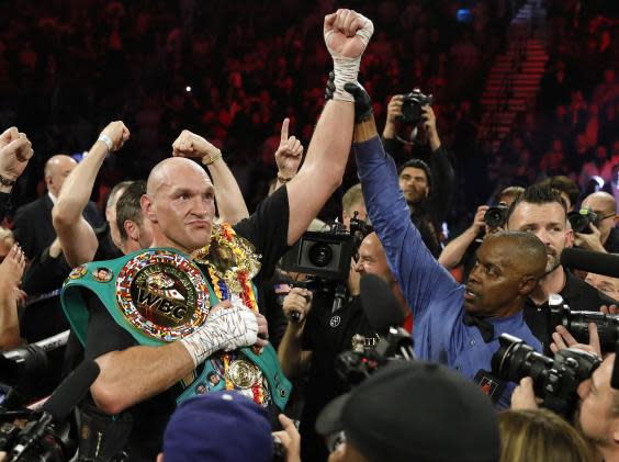 Tyson Fury celebrates in the ring (Getty)