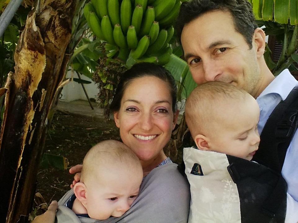 Proud parents Kathryn Tomasetti and Tristan Rutherford with twins Aurelio and Lupo on Tenerife's northern coast