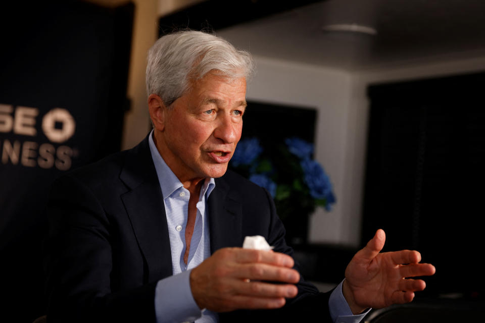 Jamie Dimon, Chairman of the Board and Chief Executive Officer of JPMorgan Chase & Co., gestures as he speaks during an interview with Reuters in Miami, Florida, U.S., February 8, 2023. REUTERS/Marco Bello