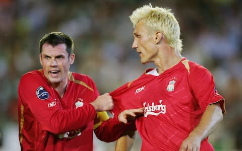 Liverpool captain Jamie Carragher barks orders to team-mate Sami Hyypia during a second half onslaught by Real Betis during the UEFA Champions League Group G match between Real Betis and Liverpool at the Estadio Ruiz de Lopera on September 13, 2005 in Seville, Spain. - Credit: Getty Images