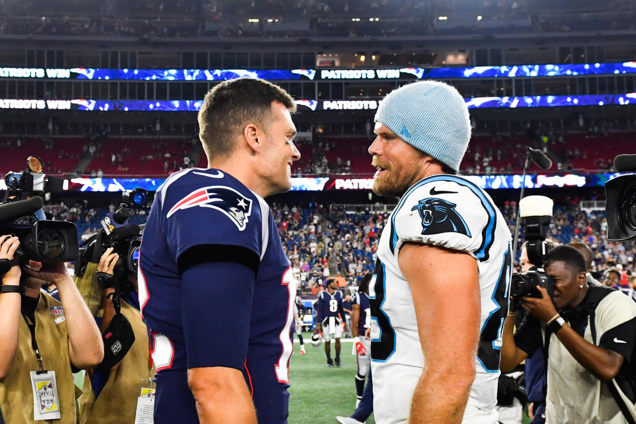 Greg Olsen, right, is likely going to cede his No. 1 role at Fox to Tom Brady. (Kathryn Riley/Getty Images)