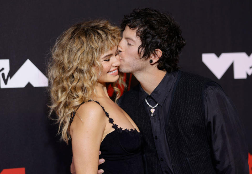 Josh kissing Debby