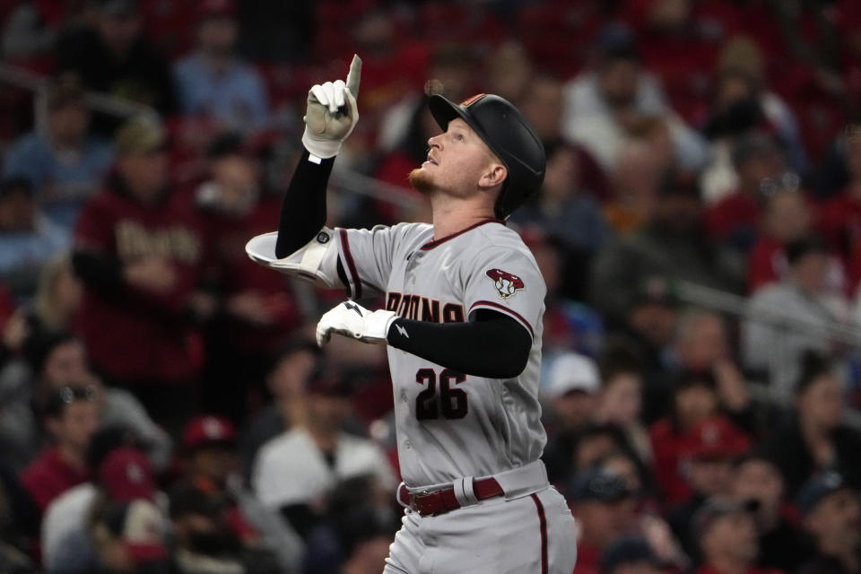 Arizona Diamondbacks' Pavin Smith celebrates after hitting a grand slam during the seventh inning of a baseball game against the St. Louis Cardinals Monday, April 17, 2023, in St. Louis. (AP Photo/Jeff Roberson)