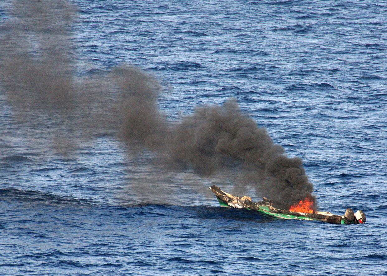 somalia piracy pirates burning boat sinking ship GettyImages 98371524