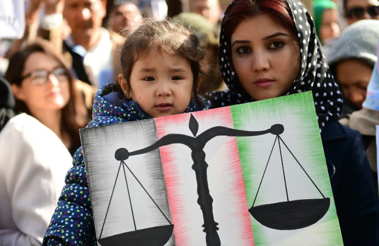 Afghan ethnic Hazaris take part in a protest calling on the Afghan government to stop discrimination against them, in front of the European Council in Brussels on October 5, 2016