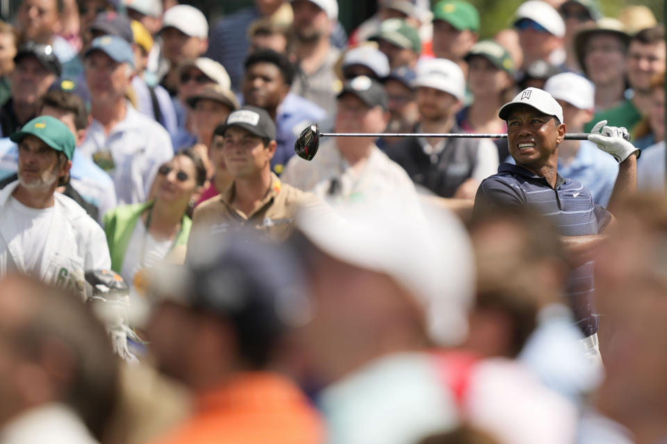 Tiger Woods watches his tee shot on the eighth hole during the second round of the Masters golf tournament at Augusta National Golf Club on Friday, April 7, 2023, in Augusta, Ga. (AP Photo/David J. Phillip)