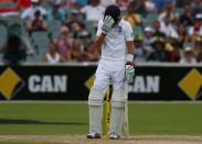 England's Joe Root reacts after his dismissal during the fourth day's play in the second Ashes cricket test against Australia at the Adelaide Oval December 8, 2013.