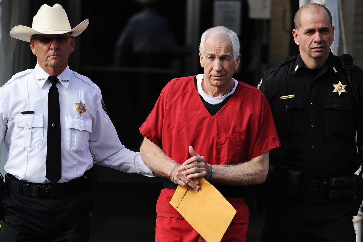 Jerry Sandusky leaves a Pennsylvania courthouse in in 2012. (Patrick Smith/Getty)