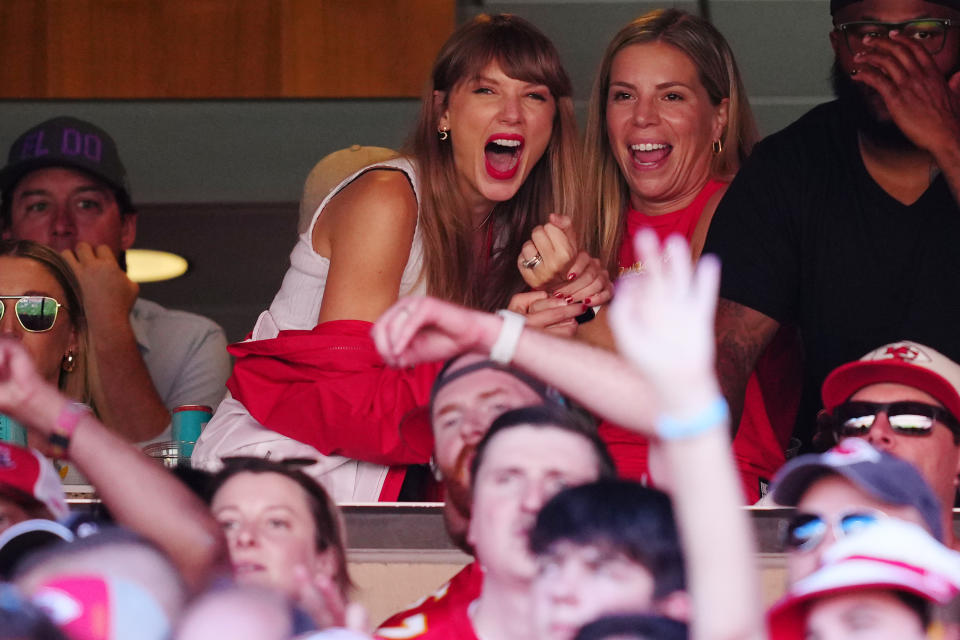 Taylor cheering at the game