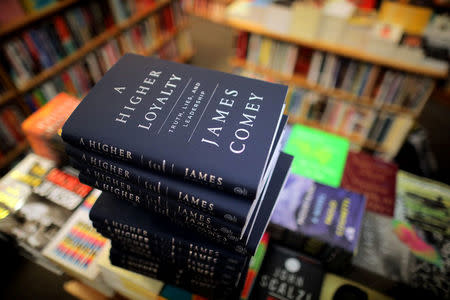 Copies of former FBI director James Comey's book "A Higher Loyalty" are seen at Kramerbooks book store in Washington D.C., U.S. April 17, 2018. REUTERS/Carlos Barria