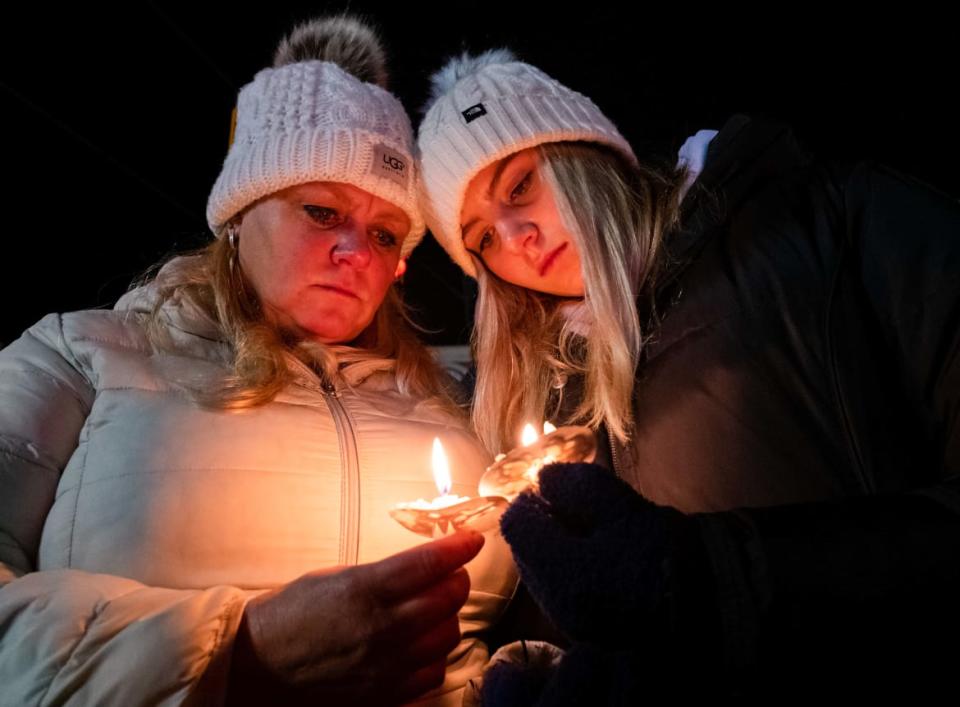 <div class="inline-image__caption"><p>Thousands gathered Friday for a vigil to remember the students killed.</p></div> <div class="inline-image__credit">Seth Herald/Reuters</div>