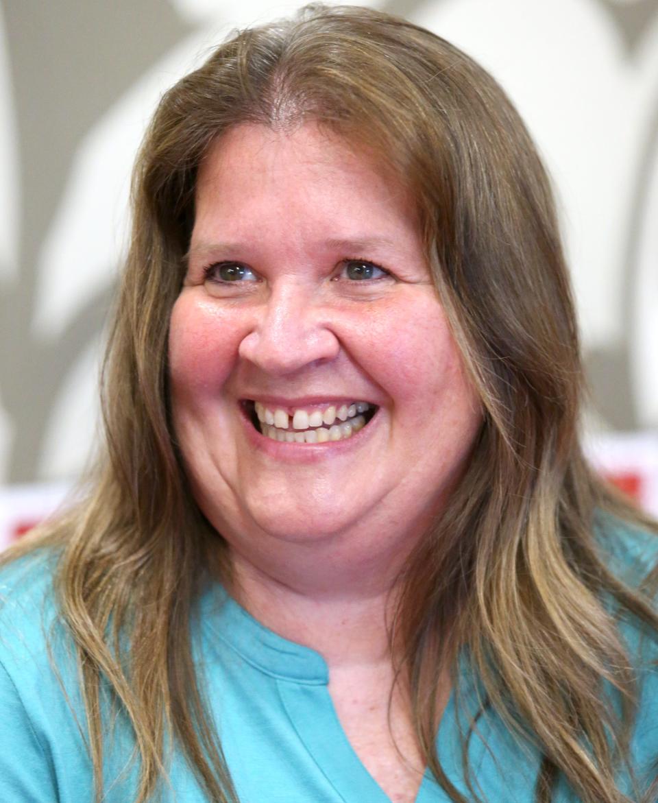 Canton South High School teacher Nancy Miller has brought a punching bag and boxing gloves to the high school to allow students punch out whatever stress they might have. Miller calls the project Take X.