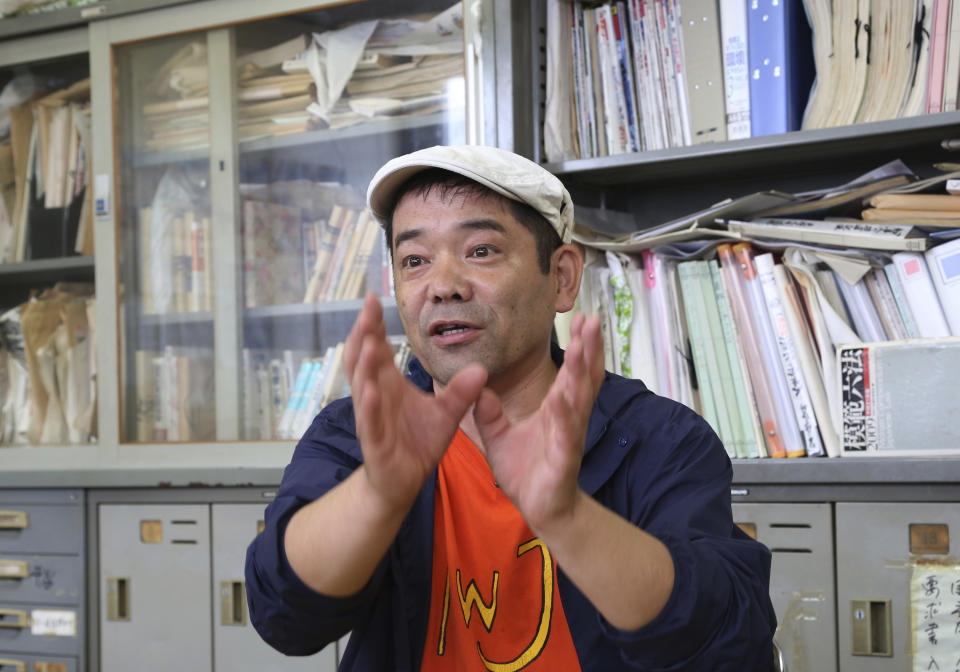 In this Sept. 26, 2018, photo, Makoto Nakazawa speaks during an interview with the Associated Press at Tsukiji fish market in Tokyo. Japan’s famed Tsukiji fish market is closing down on Saturday, Oct. 6, 2018 after eight decades, with shop owners and workers still doubting the safety of its replacement site. Nakazawa who has worked in Tsukiji for more than 30 years, fears working in Toyosu might be dangerous. (AP Photo/Koji Sasahara)