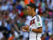 Germany's Mesut Ozil is seen at the start of their 2014 World Cup final against Argentina at the Maracana stadium in Rio de Janeiro July 13, 2014. REUTERS/Eddie Keogh (BRAZIL - Tags: SOCCER SPORT WORLD CUP)