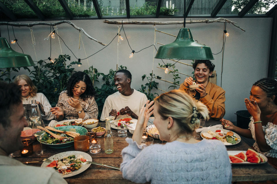 group of friends sitting around talking