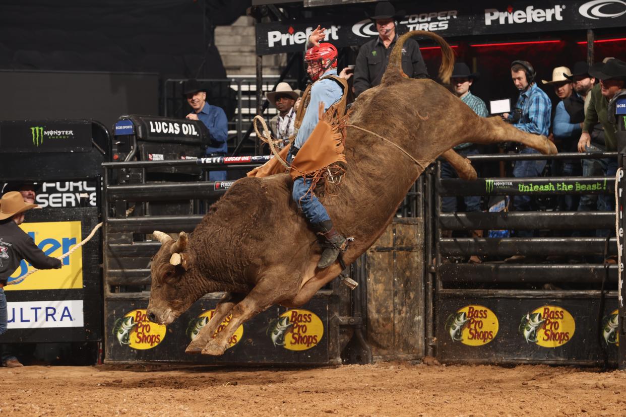 Hunter Ball attempts to ride Cooper and Scruggs Bucking Bulls' Show Me during the 2nd round of the Professional Bull Riders R Unleash the Beast event Jan. 27 in Houston, Texas.