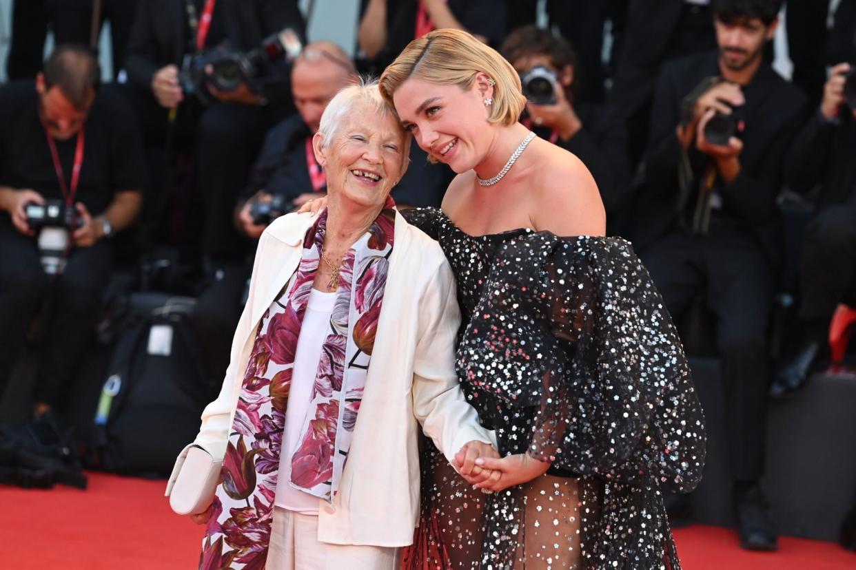 VENICE, ITALY - SEPTEMBER 05: (R) Florence Pugh and her grandmother attend the "Don't Worry Darling" red carpet at the 79th Venice International Film Festival on September 05, 2022 in Venice, Italy. (Photo by Kate Green/Getty Images)