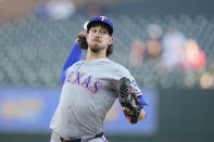 Texas Rangers pitcher Michael Lorenzen throws during the first inning of a baseball game against the Detroit Tigers, Monday, April 15, 2024, in Detroit. (AP Photo/Carlos Osorio)