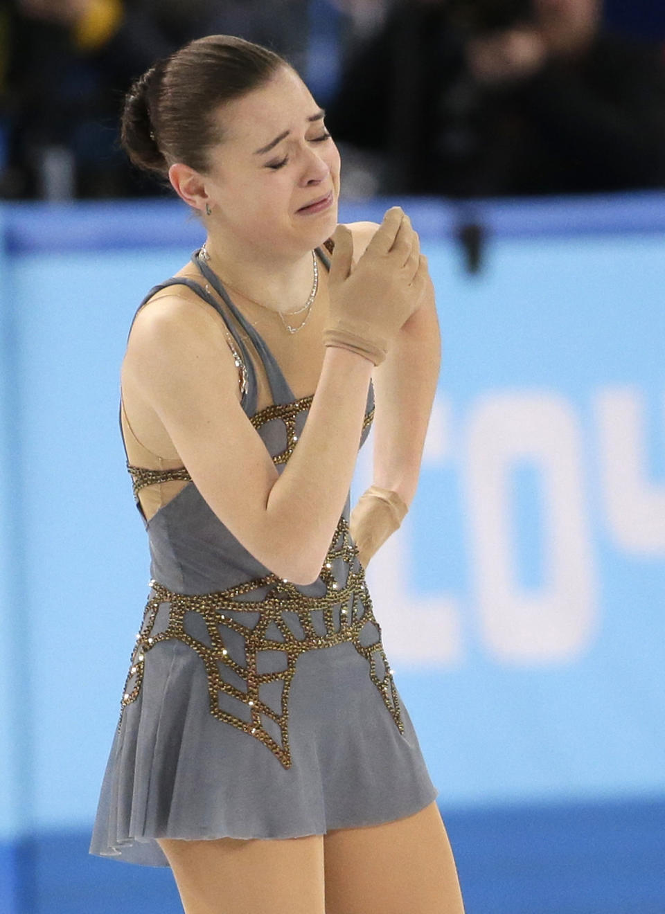 Adelina Sotnikova of Russia reacts after completing her routine in the women's free skate figure skating finals at the Iceberg Skating Palace during the 2014 Winter Olympics, Thursday, Feb. 20, 2014, in Sochi, Russia. (AP Photo/Bernat Armangue)