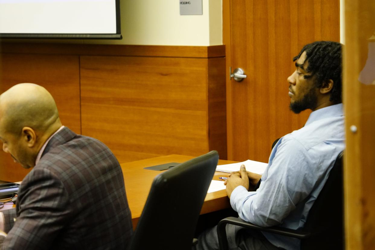 In this file photo from his first trial, Isaiah Brown-Miller (right), 23, of the Northeast Side, appeared in Franklin County Common Pleas Court with his attorney Lumumba McCord (left) on Jan. 31. Brown-Miller is facing a kidnapping charge and an aggravated robbery charge in connection with the December 2021 death of prominent Columbus imam Mohamed Hassan Adam.