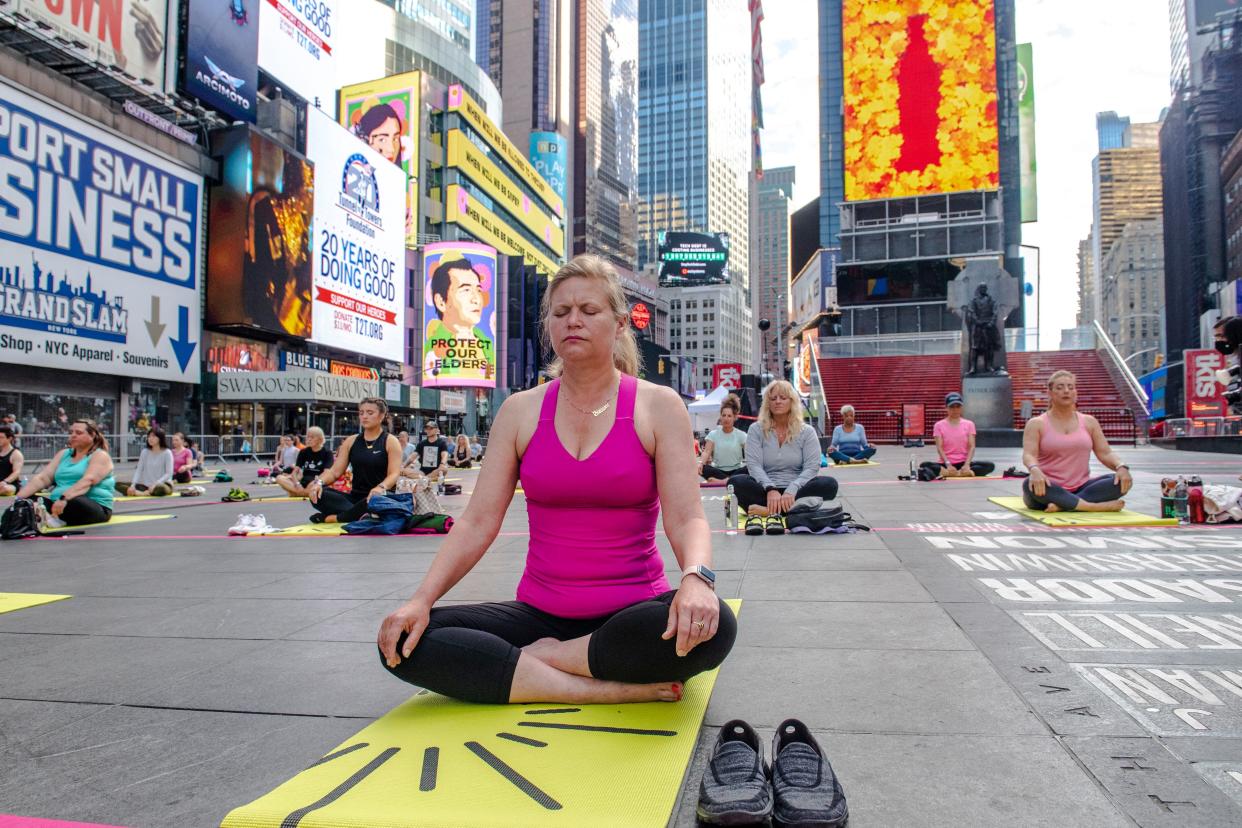 Mayoral Candidate Kathryn Garcia practices yoga poses in Times Square during an outdoor event on Sunday, June 20, in New York. 