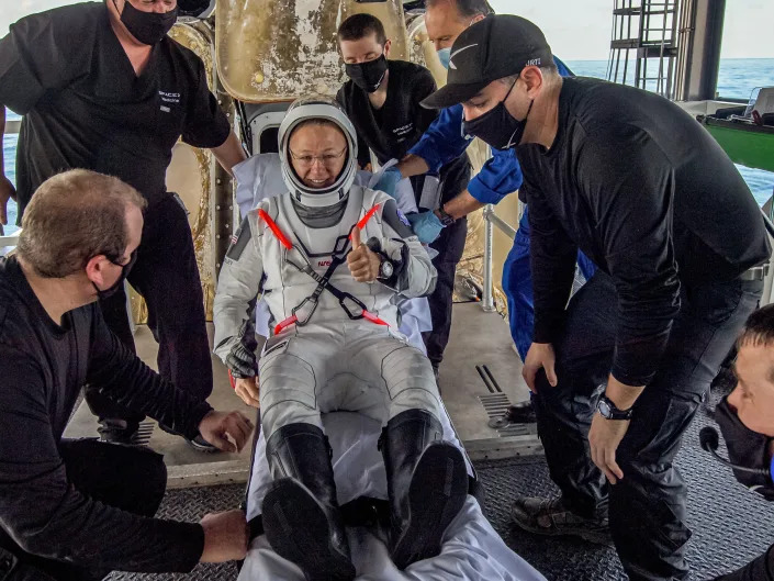 nasa astronaut doug hurley spacex crew dragon spaceship capsule demo2 demo 2 mission landing splashdown stretcher thumbs up ok august 2 2020 50186691872_3d34f9f15a_o edit