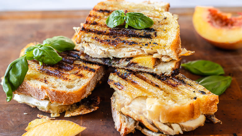 3 halves of panini on cutting board