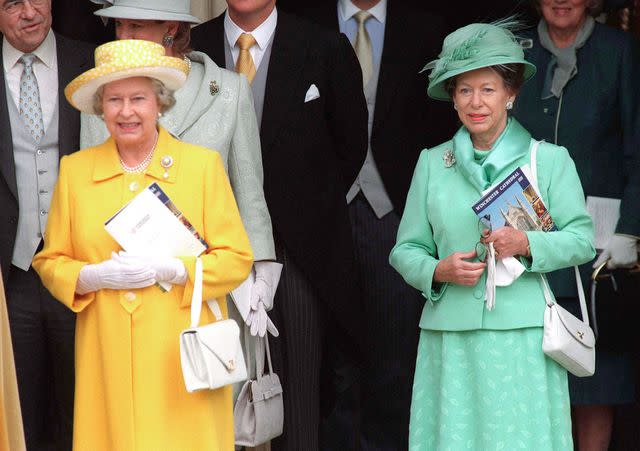 <p>UK Press/Liaison</p> Princess Margaret (right) with her sister Queen Elizabeth in Winchester, U.K. in 1998