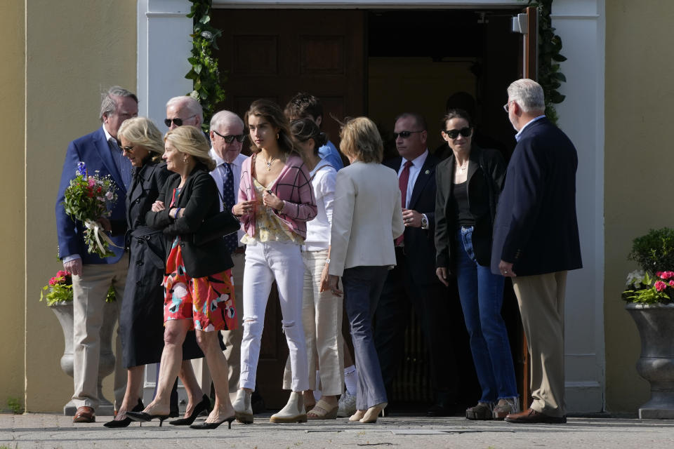 Members of the Biden family walk to the grave of the President Joe Biden's late son, Beau Biden, after attending a memorial mass at St. Joseph on the Brandywine Catholic Church in Wilmington, Del., Tuesday, May 30, 2023. Beau Biden died of brain cancer at age 46 in 2015. (AP Photo/Patrick Semansky)