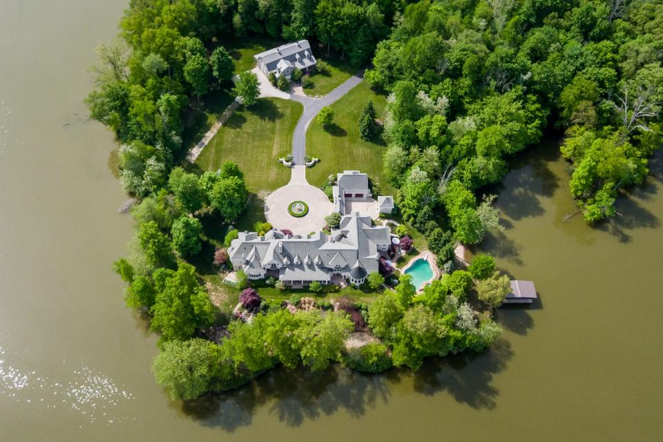 A 16,068-square-foot Batesville, Indiana, mansion on 15 acres of waterfront property will be auctioned off in April.