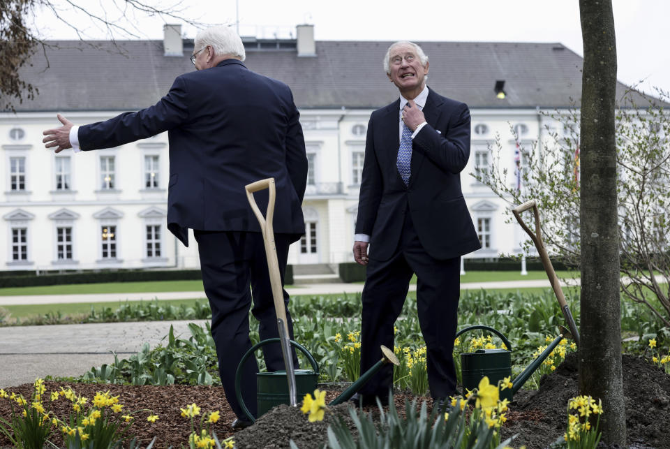 FILE - Britain's King Charles III, right, reacts beside German President Frank-Walter Steinmeier after the planted a tree in the garden of the presidential Bellevue Palace in Berlin, on March 29, 2023. (Jens Schlueter/Pool via AP, File)