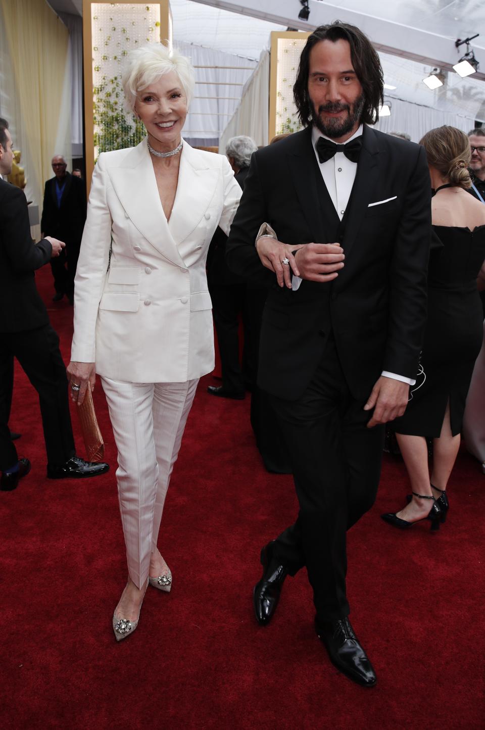 Keanu Reeves and his mother Patricia Taylor pose on the red carpet during the Oscars arrivals in 2020. (Reuters)