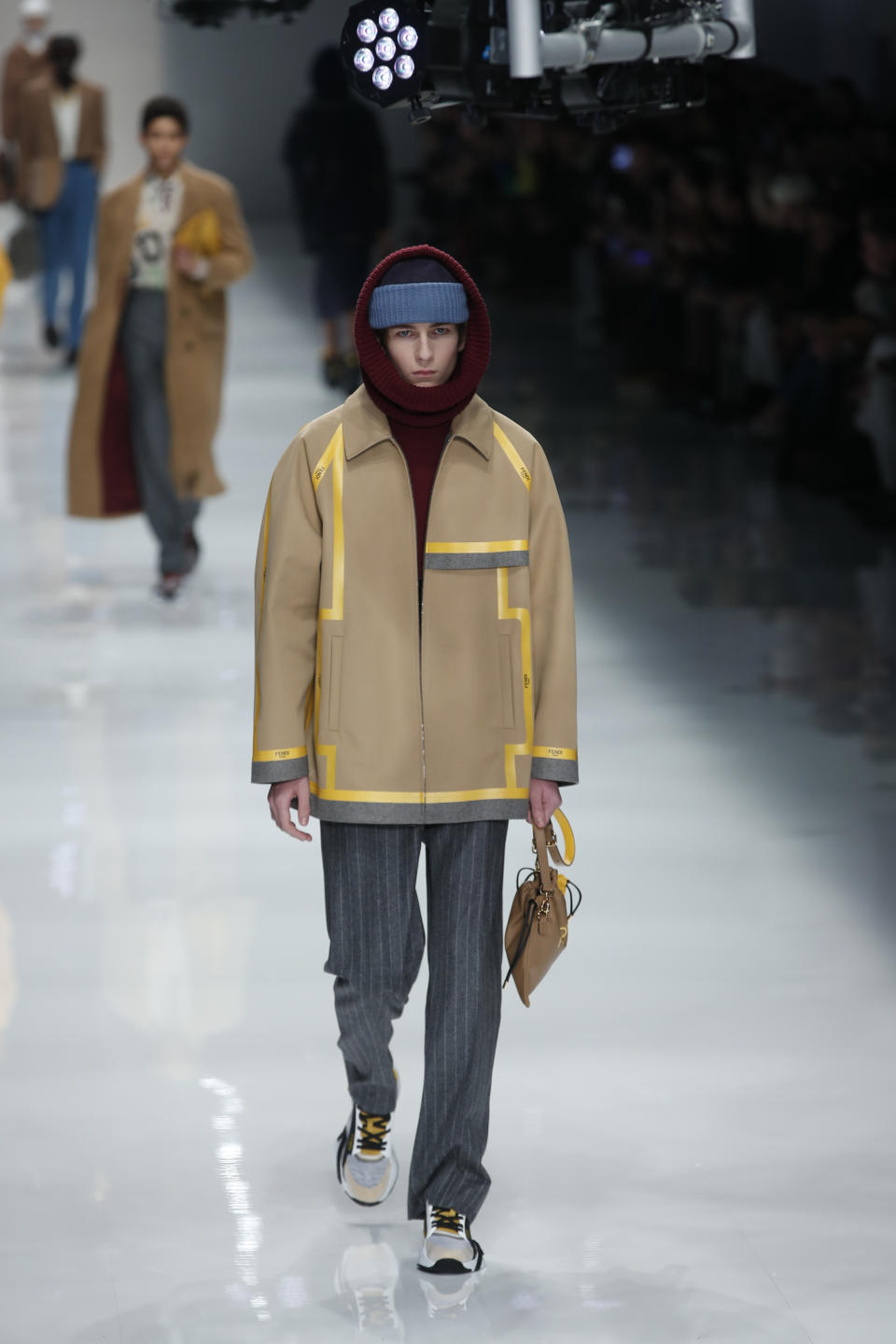 A model wears a creation as part of the Fendi men's Fall-Winter 2020/21 collection, that was presented in Milan, Italy, Monday, Jan. 13, 2020. (AP Photo/Antonio Calanni)