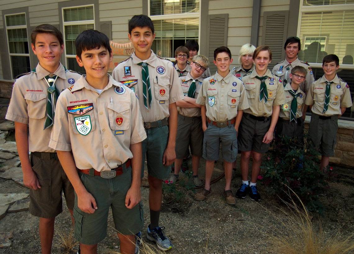 Sept. 27, 2015: “Troll Patrol” and Troop 32 Eagle Scouts (from left) Joe Trenton, 14; Nicholas Bellinger, 15; and Brad Greer, 14, with other members of their patrol at The Legacy at Bear Creek Assisted Living and Memory Care in Keller. “Troll Patrol” and Troop 32 Eagle Scouts built raised flower beds, a pergola and benches, and created a koi pond, as part of their Eagle Scout projects. A fourth Eagle Scout from the troop, Parth Purohit, created a rose garden around the flagpole in front of the facility. The 13-member “Troll Patrol,” all members of Boy Scout Troop 32 in Keller, are regulars at the facility, making improvements and helping residents with technology. They were awarded certificates and recognized for their contributions by the staff and residents. Ian McVea/Special to the Star-Telegram