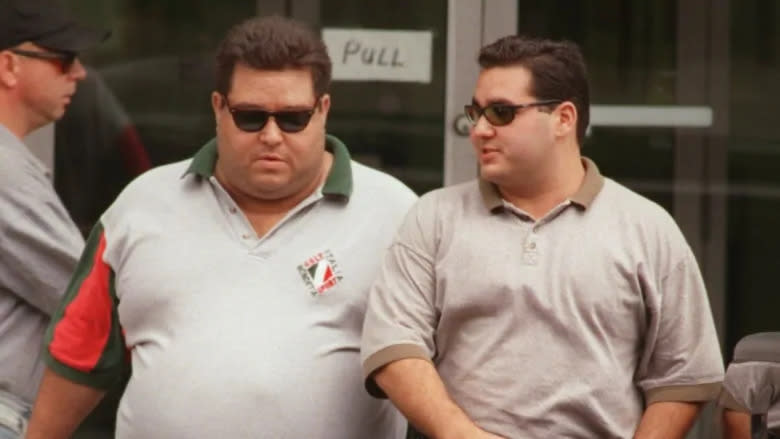 Angelo Musitano (right) and Pat Musitano leaving Provincial Court for lunch in 1998. Pat was killed in a shooting on Friday in Burlington. Angelo was killed in a targeted shooting outside his home in 2017. (Hamilton Spectator)