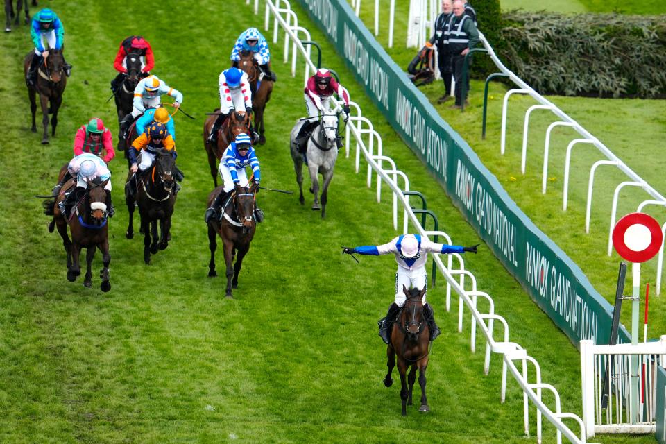 Jockey Harry Skelton, right, riding West Balboa, celebrates winning the Handicap Hurdle (AP)