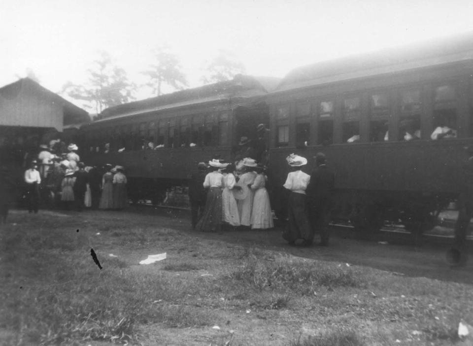 Holiday travelers at the bustline Yemassee Train Depot on Memorial Day 1895. The depots at Yemassee, Brunson, Hampton, Estill and smaller communities connected Hampton County people to each other  as well as the cities of Columbia, S.C. as well Savannah and Augusta in Georgia.