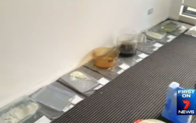 Just some of the exhibits laid out by police showing the chemicals and pre-cursors allegedly used in drug manufacturing.