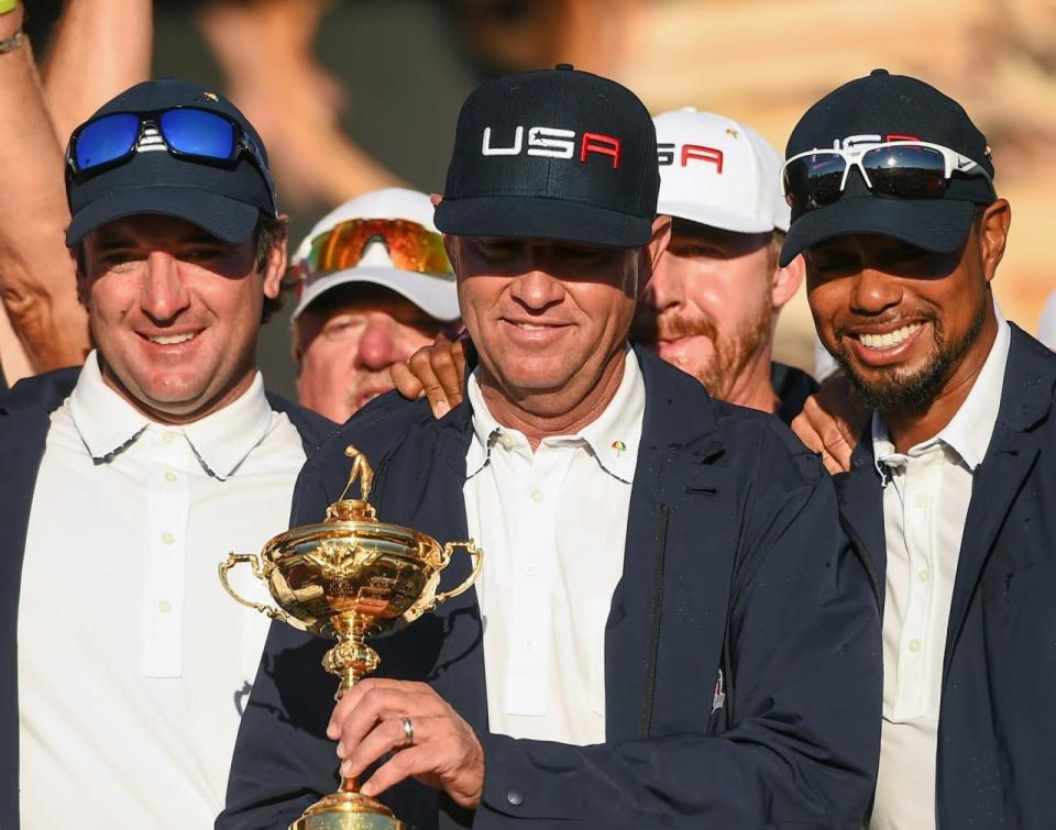 <p>Vice-captain Bubba Watson, left, USA captain Davis Love III, centre, and USA vice-captain Tiger Woods with the Ryder Cup at the Closing Ceremony of The 2016 Ryder Cup Matches at the Hazeltine National Golf Club in Chaska, Minnesota, USA. (Photo By Ramsey Cardy/Sportsfile via Getty Images)</p>