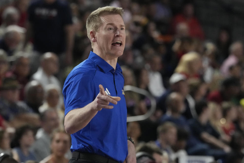 Tulsa head coach Eric Konkol gestures during the first half of an NCAA college basketball game against Florida Atlantic, Saturday, Feb. 3, 2024, in Boca Raton, Fla. (AP Photo/Marta Lavandier)