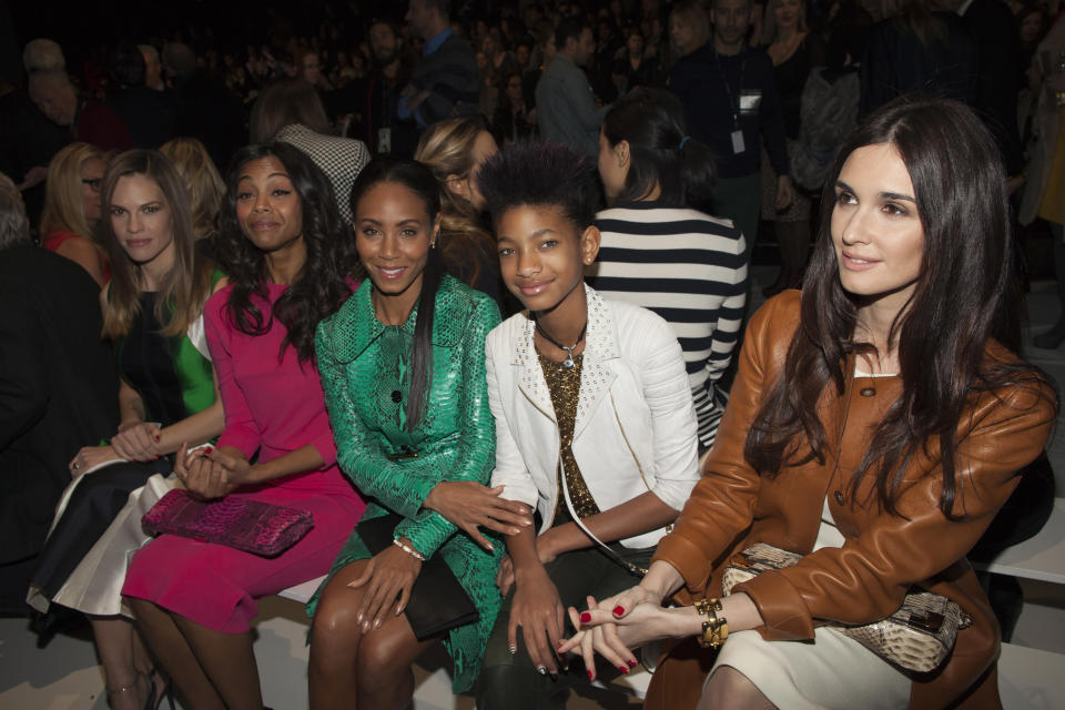 (L-R) Hilary Swank, Zoe Saldana, Jada Pinkett Smith, Willow Smith and Paz Vega attend the Michael Kors Autumn/Winter 2013 collection during New York Fashion Week February 13, 2013. REUTERS/Andrew Kelly (UNITED STATES - Tags: FASHION ENTERTAINMENT) - RTR3DR13