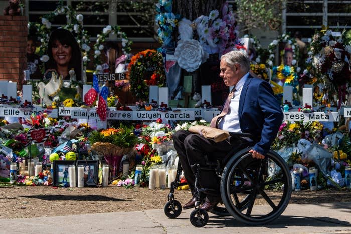 Gov. Greg Abbott at a makeshift memorial outside of Robb Elementary School in Uvalde, Texas, on May 29, 2022.