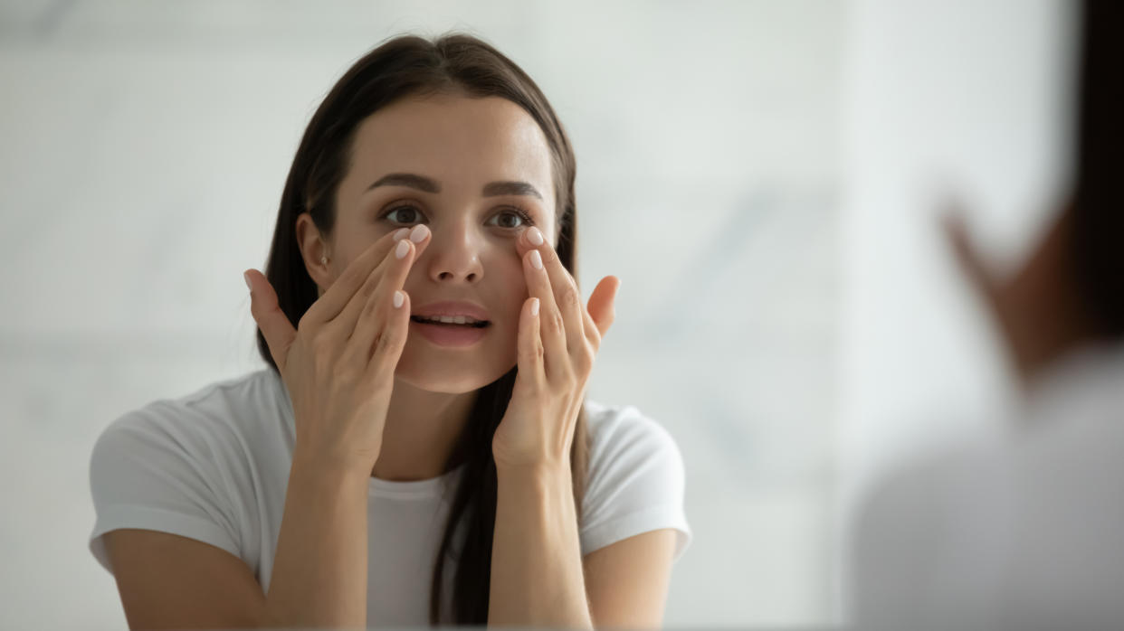 Adding an eye cream to my skincare routine helped my makeup last longer throughout the day. (Image via Getty Images)